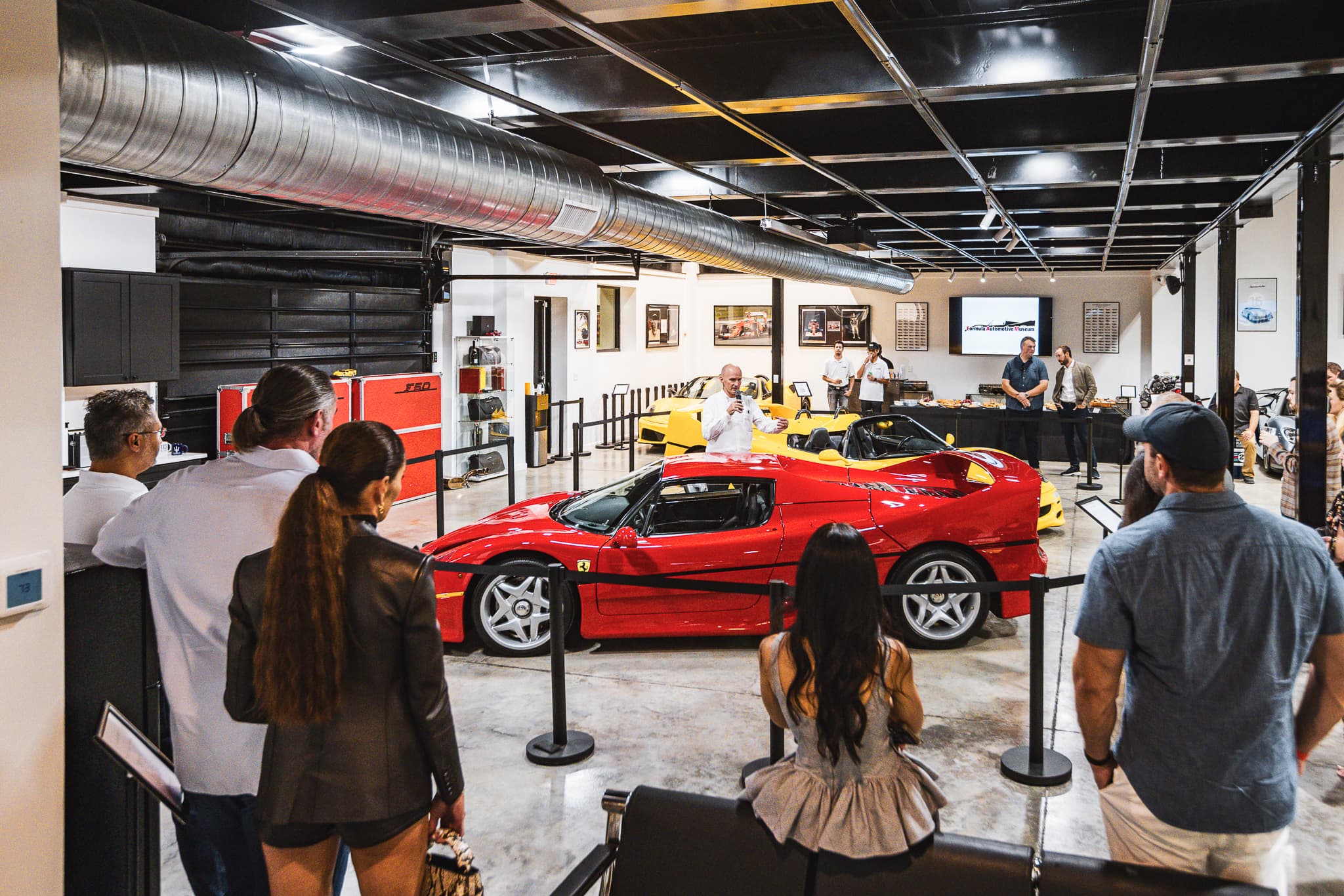 Luxury vehicle exhibit at Formula Automotive Museum Houston